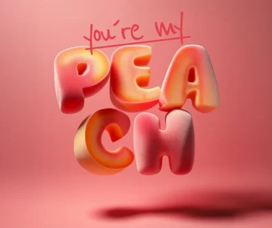 3D-bokstäver av persika som formar ordet peach